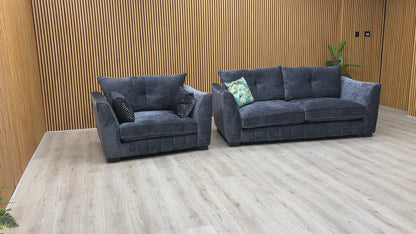 Product video tour of the ‘Allure’ Coco Indigo Sofa and Snuggler Set, demonstrating the fabric texture, seat comfort, and high-quality build.