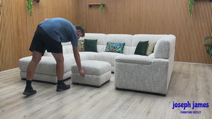 Video Of ‘Nova’ contemporary left-hand facing chaise end corner sofa, beautifully upholstered in a durable Fab MGA R04 Beige fabric and paired with a matching storage footstool.