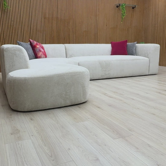 Video preview image for the product, demonstrating the size, fabric, and overall features of the 'Los Angeles' Corner Chaise Sofa.