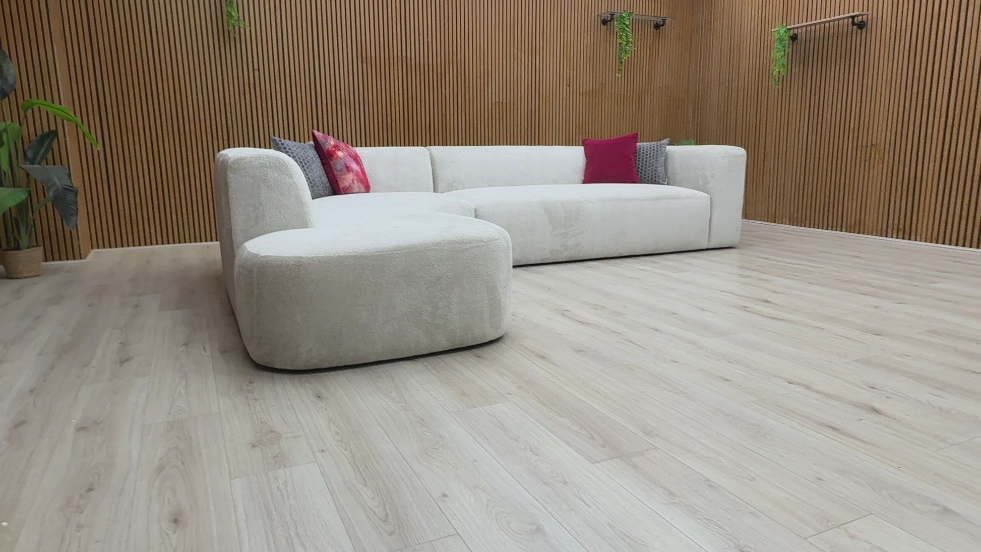 Video preview image for the product, demonstrating the size, fabric, and overall features of the 'Los Angeles' Corner Chaise Sofa.