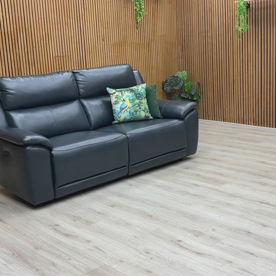 Video demonstration showing the Utah sofa's smooth power reclining mechanism and a close-up of the 100% real navy leather.