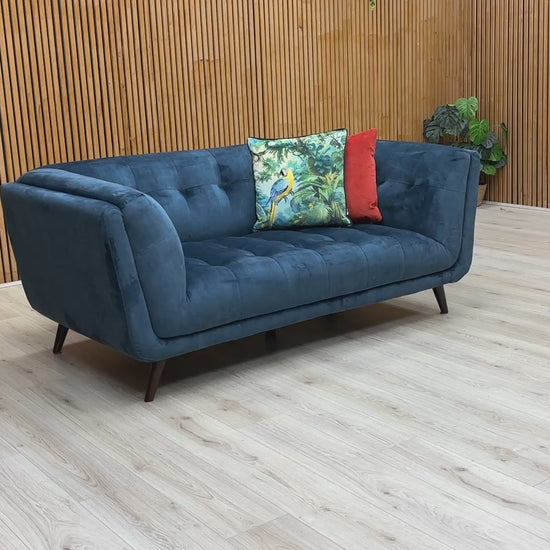 Video of The 'Rene' 2 Seater Sofa in a room setting, emphasizing its contemporary/modern style and elegant blue color.