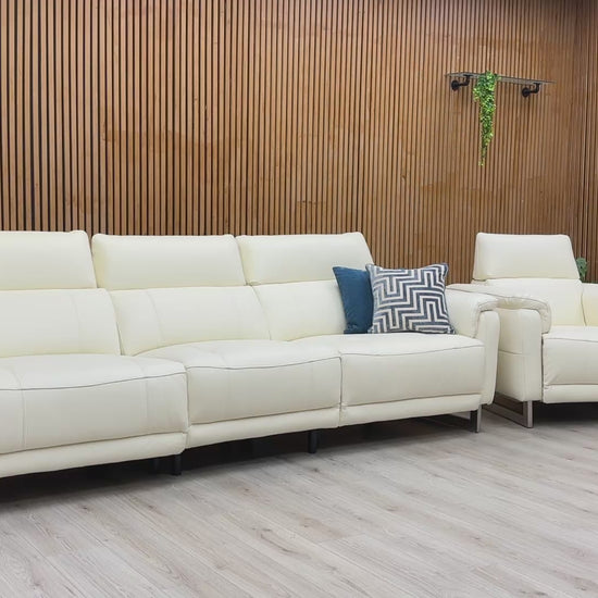 Product video tour of the ‘Moet’ Cotton White Leather Recliner Set, demonstrating the smooth power reclining mechanism, telescopic headrest adjustment, and leather quality.