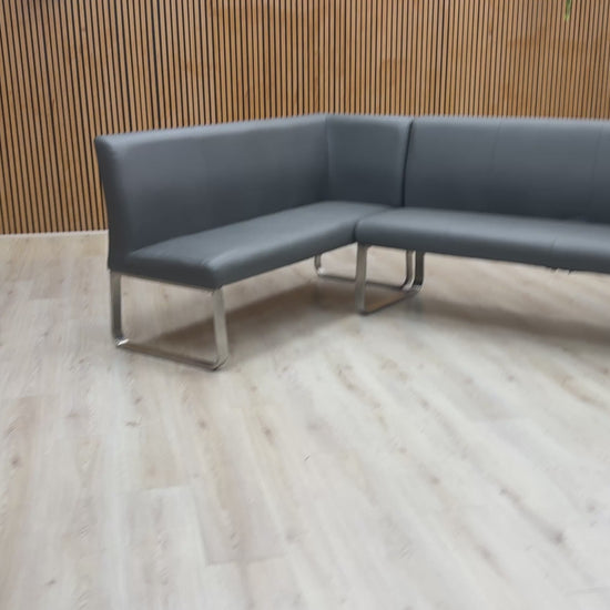 Video demonstration of the Cocoon corner bench's sturdy build and the smooth texture of its grey faux leather.