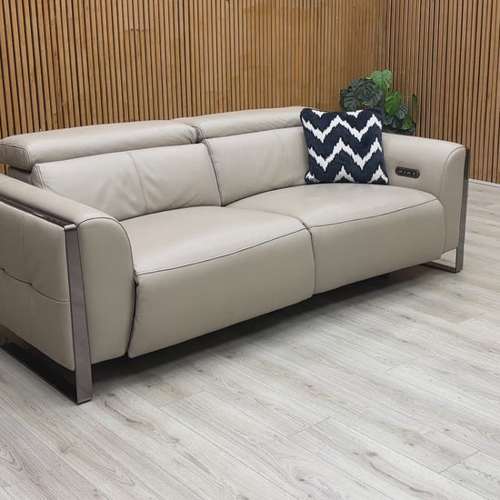 Video demonstration of the smooth power reclining mechanism and adjustable headrest functions of the Gisella sofa.