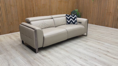 Video demonstration of the smooth power reclining mechanism and adjustable headrest functions of the Gisella sofa.