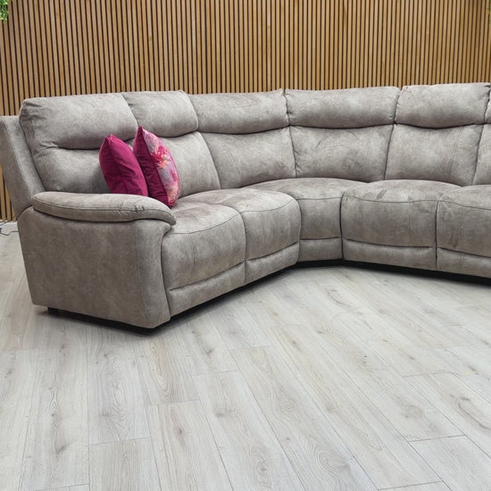 Video walk-around of the Sloane velvet corner sofa, detailing the fabric sheen, deep seating comfort, and spacious 2+2 layout.