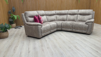 Video walk-around of the Sloane velvet corner sofa, detailing the fabric sheen, deep seating comfort, and spacious 2+2 layout.