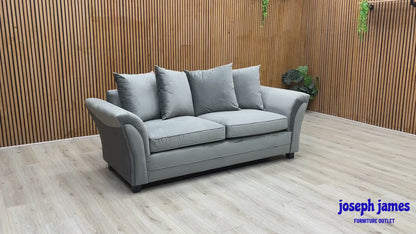 Video Of ‘Leila’ contemporary living room suite, showcasing two matching 3-seater sofas beautifully upholstered in a durable, modern Grey fabric with a clean linear profile.