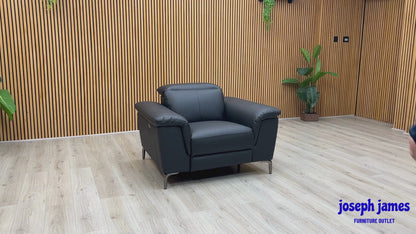 Video Of ‘Lorenza’ contemporary power recliner armchair, beautifully upholstered in a premium matte Black Leather Mix finish.