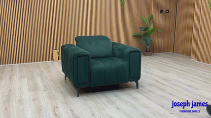 Video Of ‘Elphaba’ contemporary power recliner armchair, beautifully upholstered in an elegant, rich Opulence Bottle Green fabric, featuring integrated storage armrests.