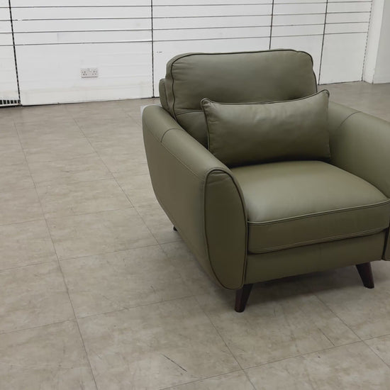 Video demonstration of the Fabb 'Ava' khaki green leather armchair, highlighting the leather quality and modern design.