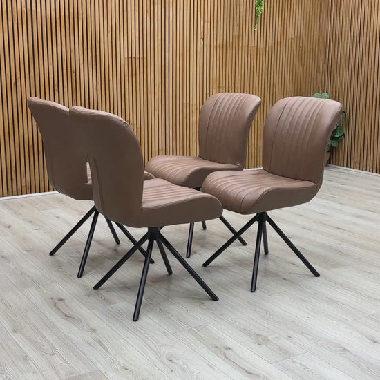Product video tour of the Bodahl ‘Terra’ Tan Brown Leather Swivel Dining Chairs, demonstrating the smooth auto-return swivel mechanism, premium leather texture, and robust frame stability.