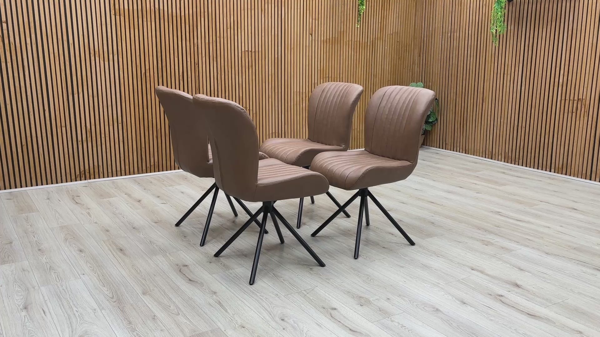 Product video tour of the Bodahl ‘Terra’ Tan Brown Leather Swivel Dining Chairs, demonstrating the smooth auto-return swivel mechanism, premium leather texture, and robust frame stability.