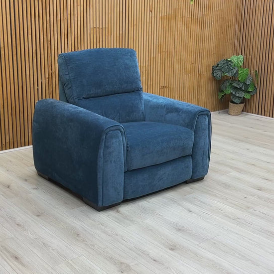 Video demonstrating the Power Recliner function and pull-out Storage Arms with Cup Holders.