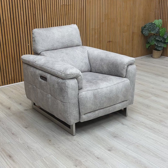 Video tour demonstrating the smooth independent power recline and storage arm functionality.