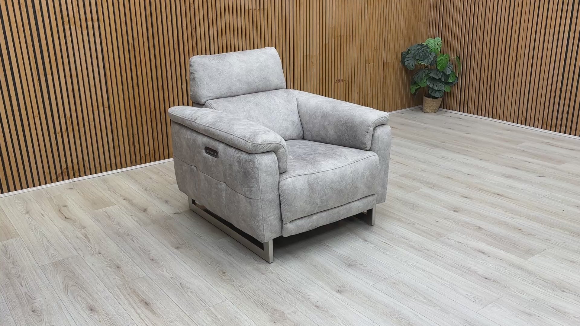 Video tour demonstrating the smooth independent power recline and storage arm functionality.