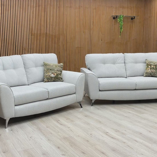Video presentation showing the fine texture details of the plain silver fabric weave and demonstrating the high-back comfort of the Dawson seating units.