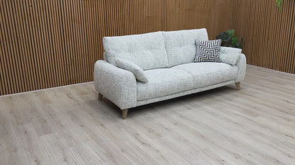 Video tour of the ‘Malmo’ 3-seater sofa, demonstrating the soft fabric texture and the all-over support of the sprung seat suspension.