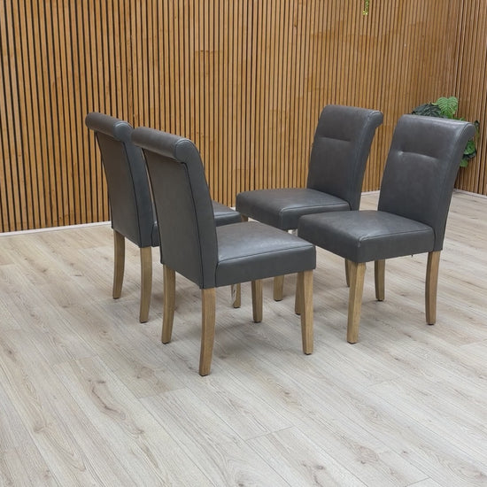 Video tour showcasing the build quality, cushioning, and faux leather finish of the Lewis dining chairs.