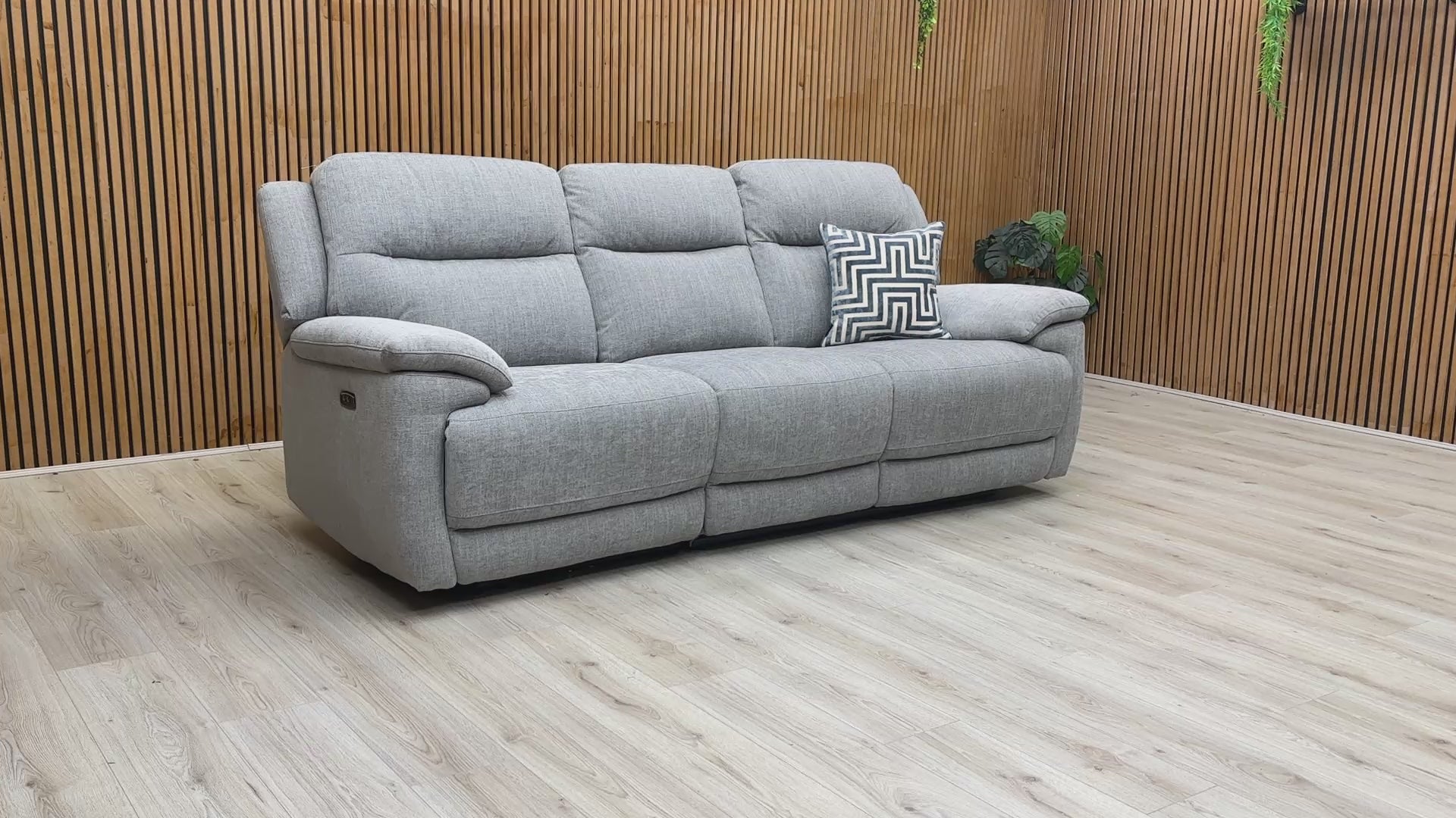 Product video tour of the ‘Touch’ Pewter Fabric 3 Seater Power Recliner, demonstrating the smooth reclining motion, the fabric's durability, and the USB port functionality.