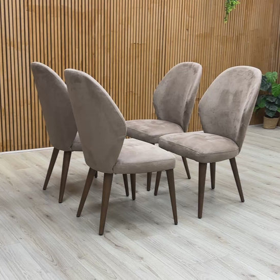 Video of a single Stone International ‘Empire’ R066 Dining Chair, highlighting the comfortable foam cushioning and high-end modern look.