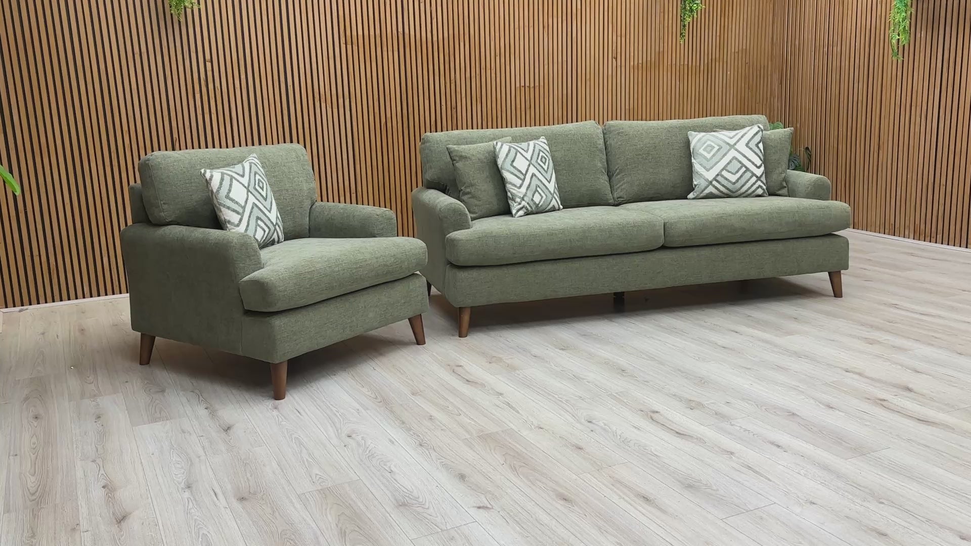 Video preview demonstrating the luxurious feel and design details of the 'Jackson' Fern Green Chenille Fabric sofa and chair.