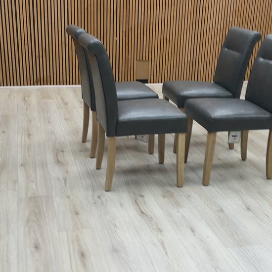 Video demonstration of the Lewis set of 4 dining chairs, showing the cushioned seating and rubberwood legs.