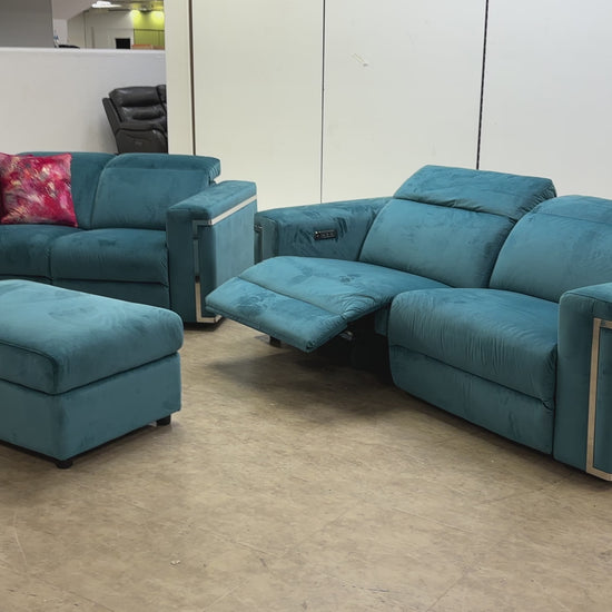 Video demonstrating the functionality of the 'Cora' teal velvet sofa set, showing the electric recliners and power headrests in action.