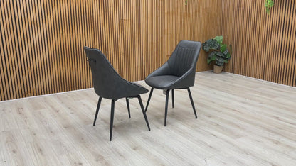 ‘Crete' Dark Grey Faux Leather Pair of Swivel Dining Chairs