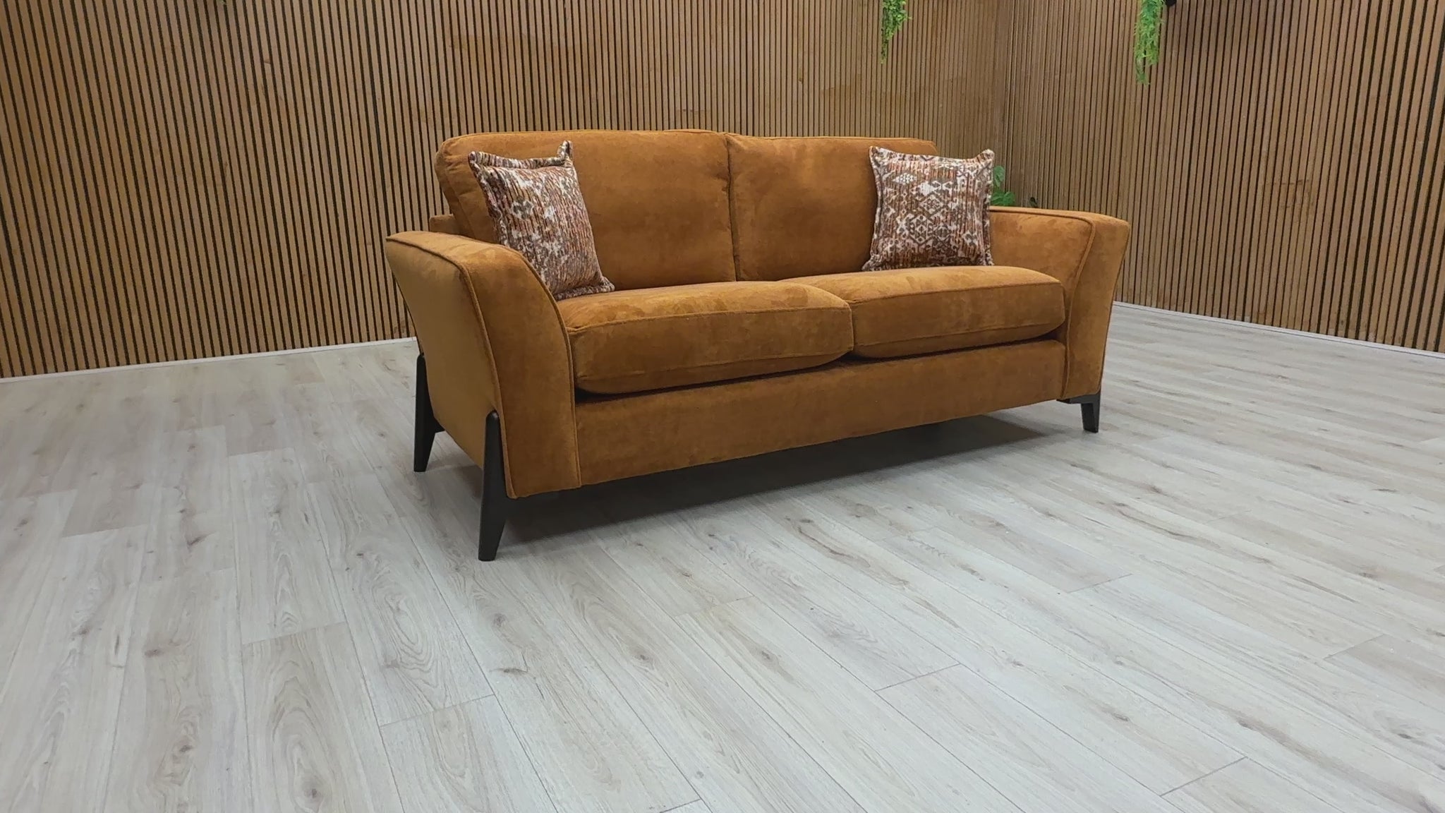 Video preview image for the product, demonstrating the size, fabric, and overall features of the 'Collins' Almond Orange Towel Velvet 3 Seater Sofa.