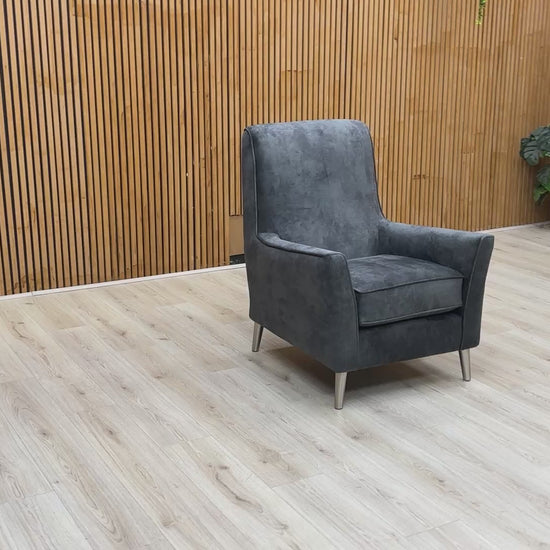 Video demonstration of the ‘Collins’ accent chair, showcasing the depth of the granite grey velvet and overall seating comfort.