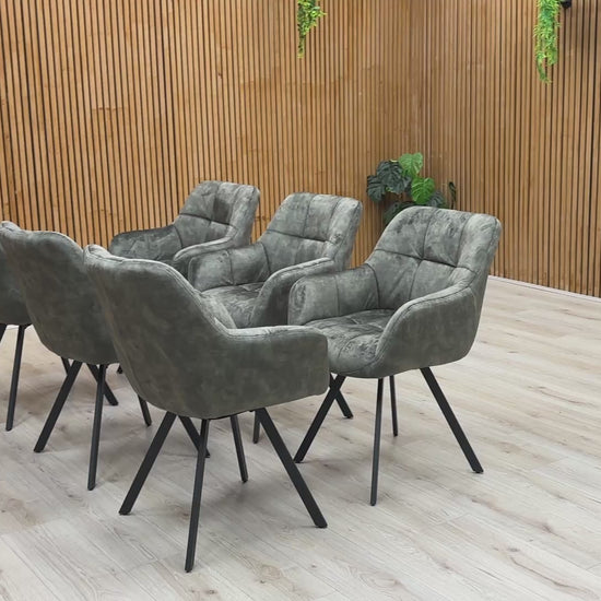 Video preview of the 'Jade' Olive Green Velvet Swivel Dining Chair, demonstrating the 360-degree swivel function.