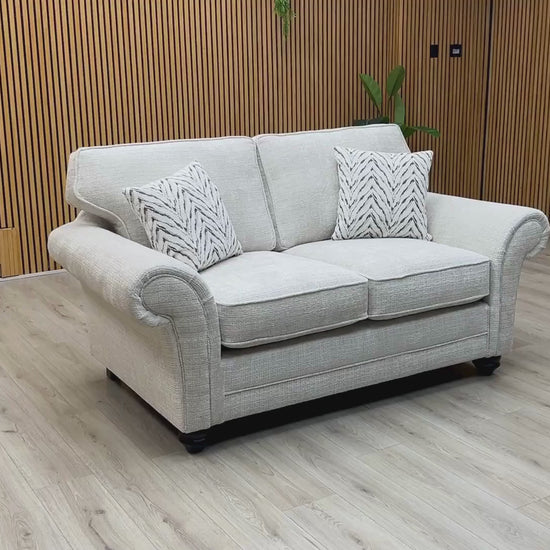 Video Of ‘Clara’ contemporary 2-seater stationary sofa, beautifully upholstered in high-grade Beige woven fabric with a sleek modern design.
