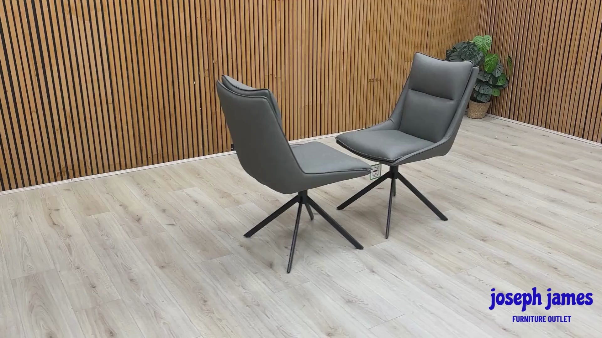 Video Of ‘Catalina’ contemporary dining suite, featuring a matching set of 2 swivel dining chairs beautifully upholstered in a sophisticated Dark Grey faux leather.