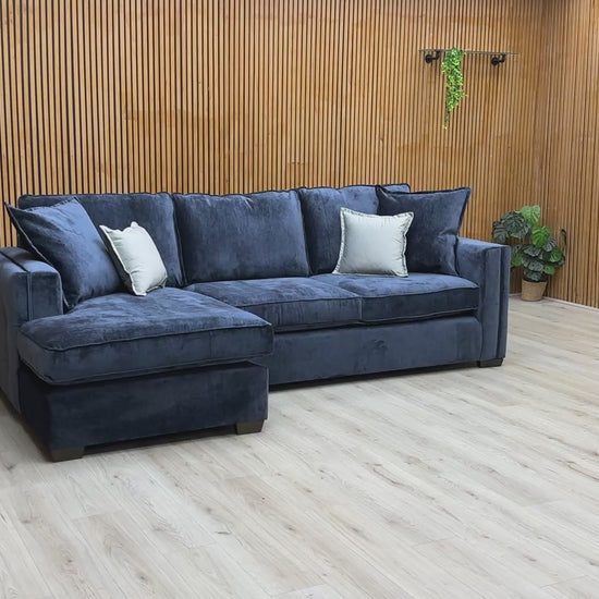 Product walkthrough of the Chelsea Large Corner Chaise, demonstrating the textured soft weave fabric and the comfort of the medium-firm foam cushions.