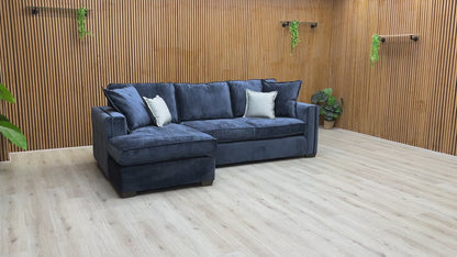 Product walkthrough of the Chelsea Large Corner Chaise, demonstrating the textured soft weave fabric and the comfort of the medium-firm foam cushions.