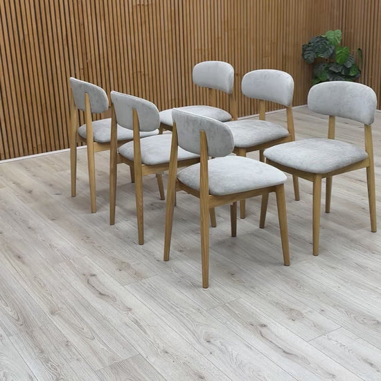 Video showcasing the 360-degree build quality and fabric texture of the Stockholm upholstered chair.