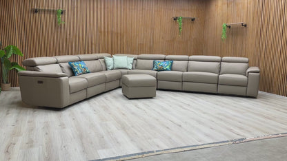 Product video play button for the Nicoletti Davide corner sofa, demonstrating the three independent power recline mechanisms and integrated storage features.