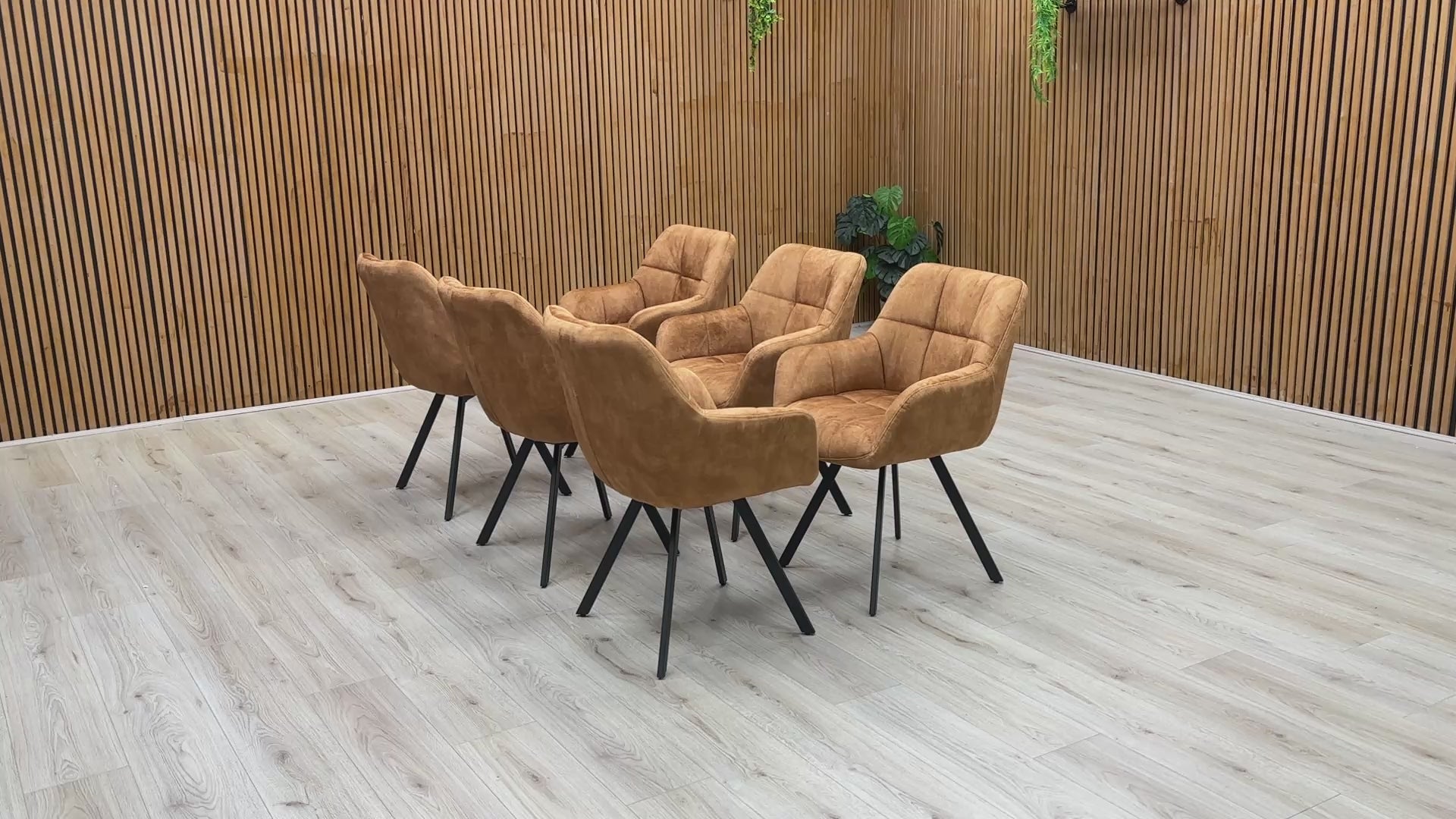 Video preview of the 'Jade' Rust Orange Velvet Swivel Dining Chair, demonstrating the 360-degree swivel function.