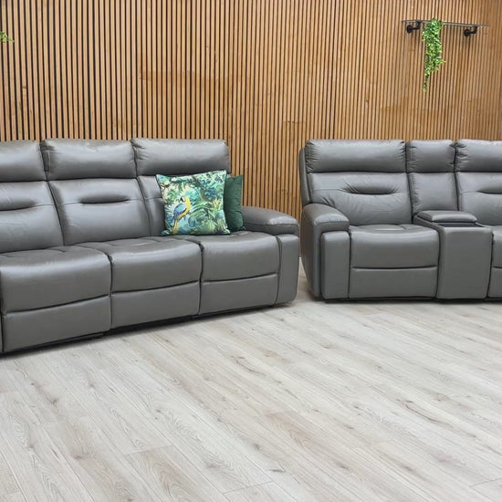 Video demonstrating the power reclining, headrest, and media console features of the Cinemax sofa set.