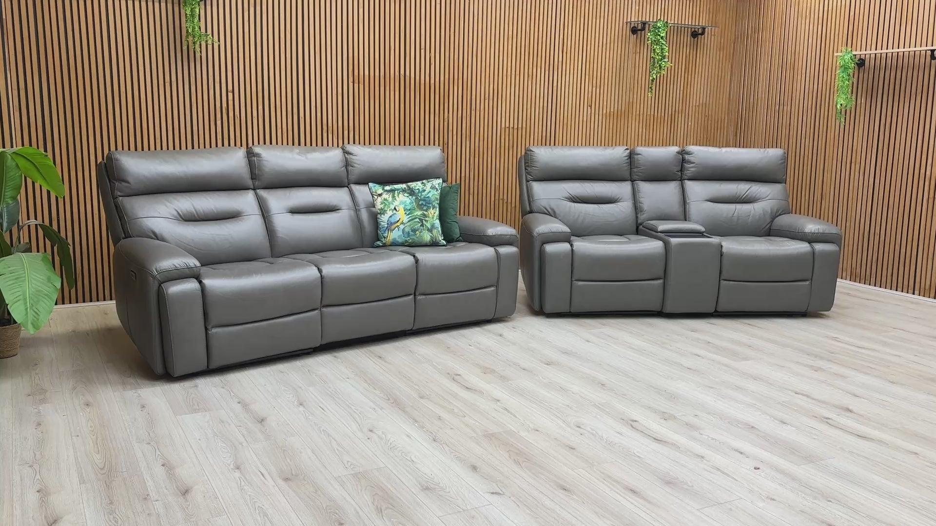 Video demonstrating the power reclining, headrest, and media console features of the Cinemax sofa set.