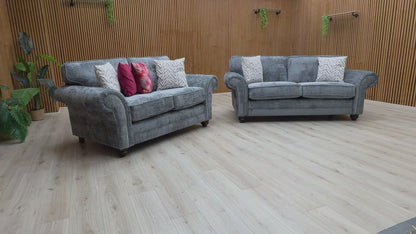 Video for a clip demonstrating the features and woven bluish-grey fabric texture of the 'Clara' Sofa Set.