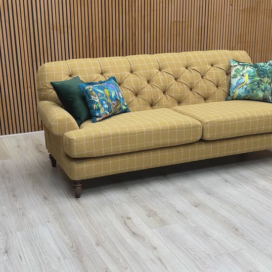 Product video tour of the ‘Canterbury’ Check Ochre and Oatmeal 4 Seater Sofa, demonstrating the fabric’s texture, the supportive button-back design, and the generous seating area.