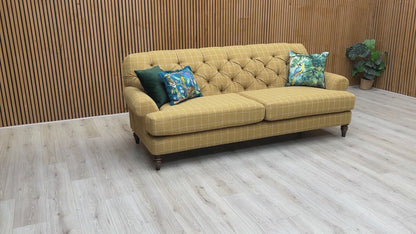 Product video tour of the ‘Canterbury’ Check Ochre and Oatmeal 4 Seater Sofa, demonstrating the fabric’s texture, the supportive button-back design, and the generous seating area.