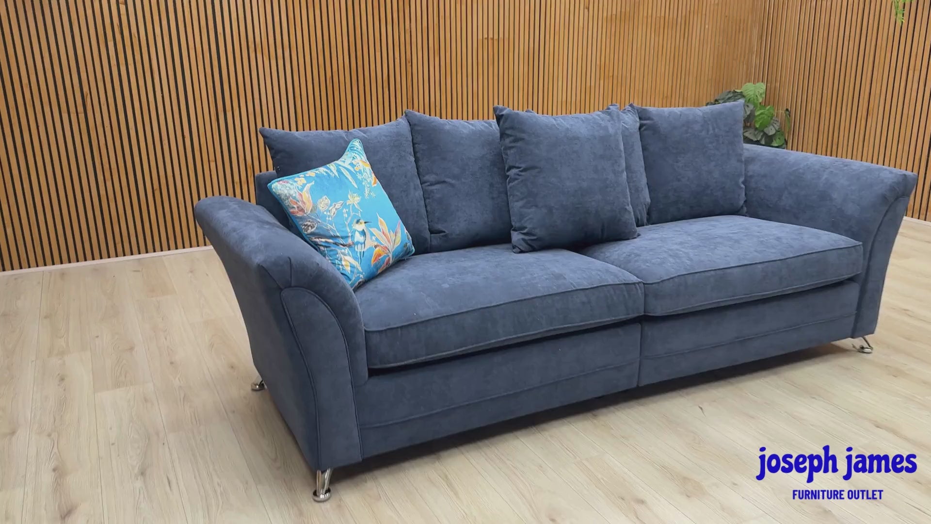 Video Of ‘Dury’ contemporary 4-seater sofa, beautifully tailored in textured rich Blue fabric upholstery with an innovative split-frame design for easy home delivery.
