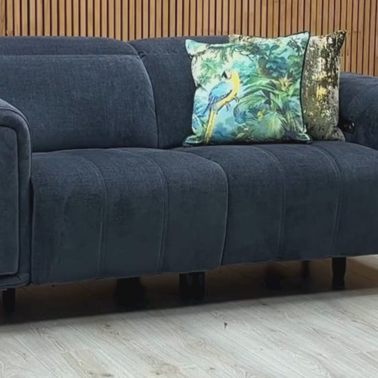 Video Of ‘Elphaba’ contemporary living room motion suite, featuring a 2-seater power recliner sofa beautifully upholstered in high-grade Manhattan Indigo 58009 fabric with integrated storage arms.