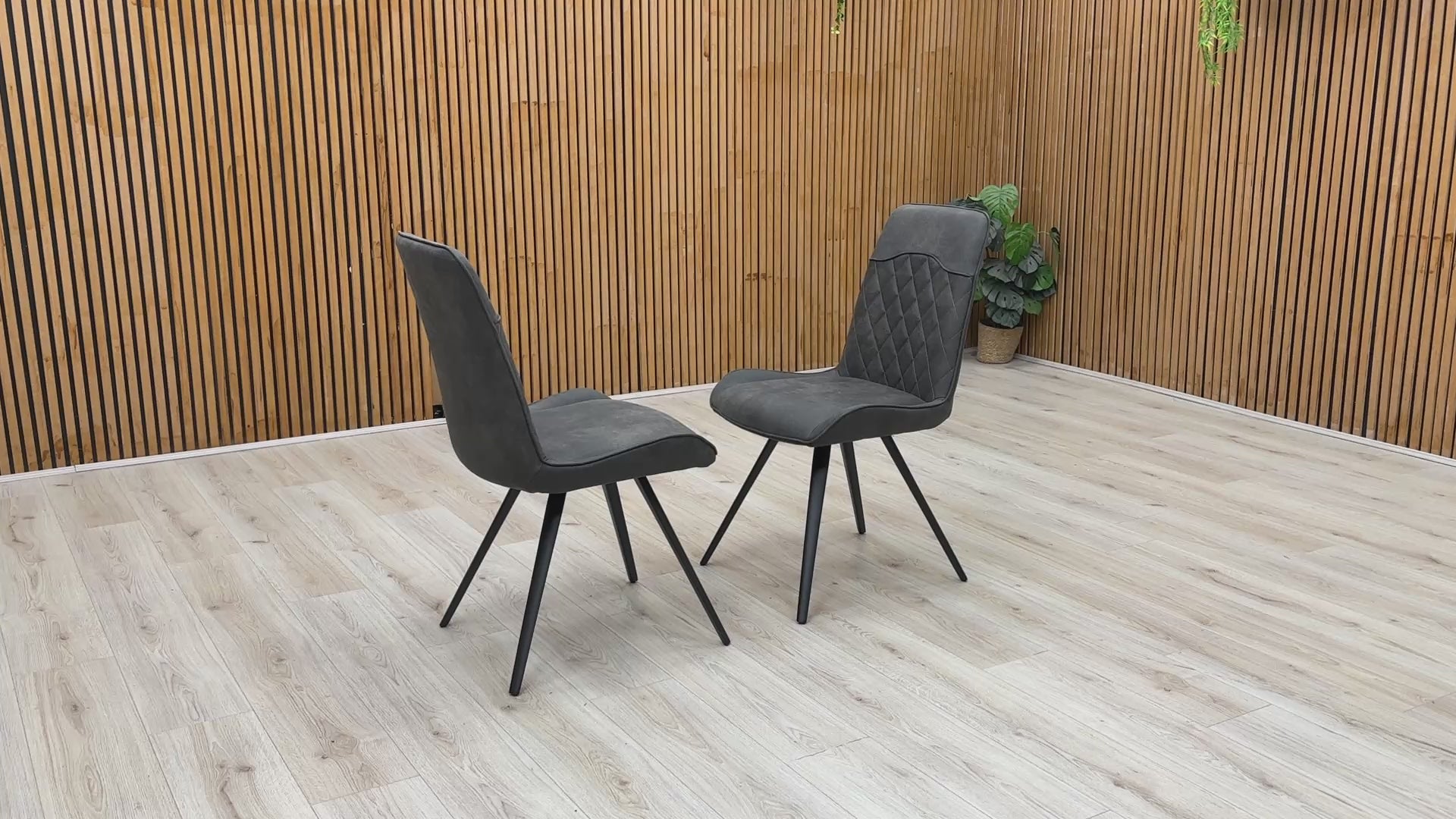 Product video tour of the ‘Warrior’ Charcoal Grey Fabric Cantilever Dining Chairs, demonstrating the structural flex and stability of the frame, fabric resilience, and overall build quality.