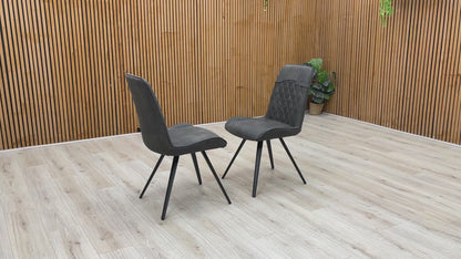 Product video tour of the ‘Warrior’ Charcoal Grey Fabric Cantilever Dining Chairs, demonstrating the structural flex and stability of the frame, fabric resilience, and overall build quality.
