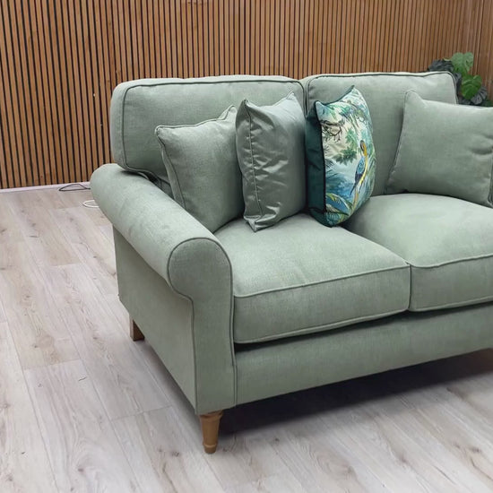 Video Of ‘William’ 2-seater sofa, beautifully tailored in rich, matte Cosmo Olive Green fabric upholstery.